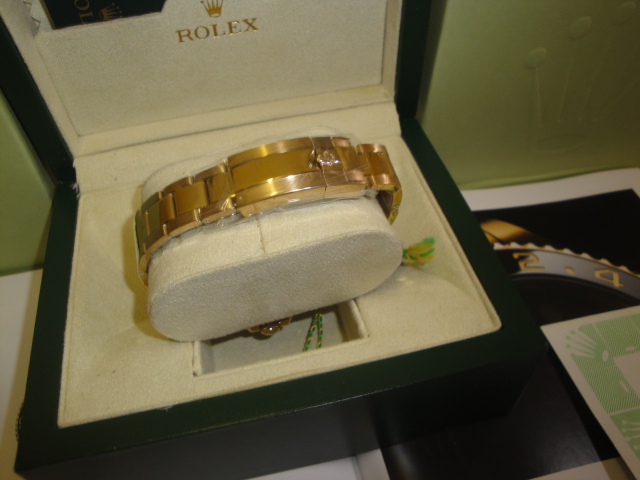 rolex replica GMT master II oro green dial ceramica orologio replica - immagine 9